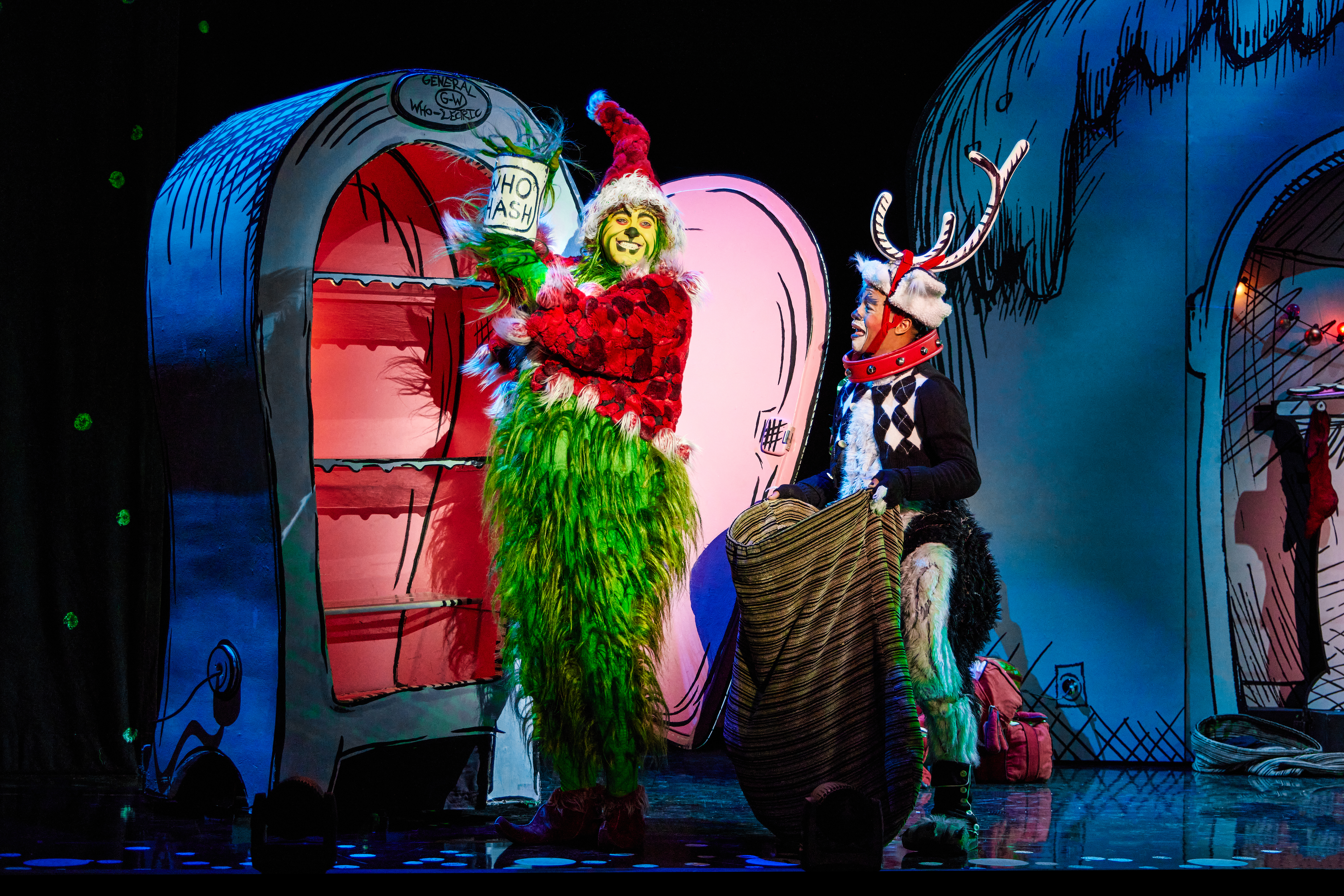 James Schultz as THE GRINCH and Xavier McKnight as Young Max in the Touring Company of Dr. Seuss’ HOW THE GRINCH STOLE CHRISTMAS! The Musical. Photo by Jeremy Daniel.